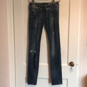 Diesel torn skinny jeans. Slight stretch.